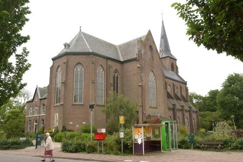 Met z’n kont naar de weg